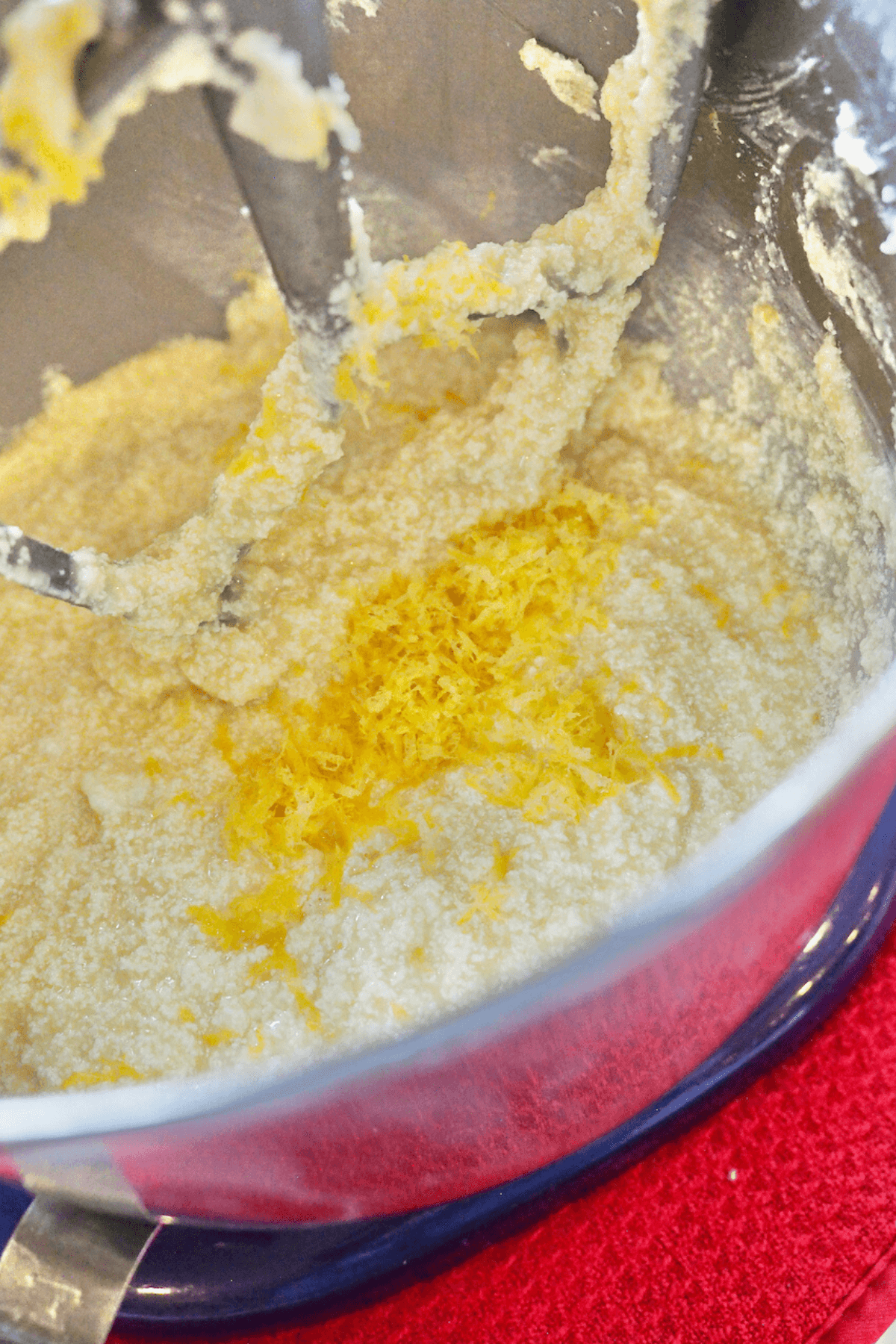 Adding lemon juice and lemon zest to ricotta mixture. 