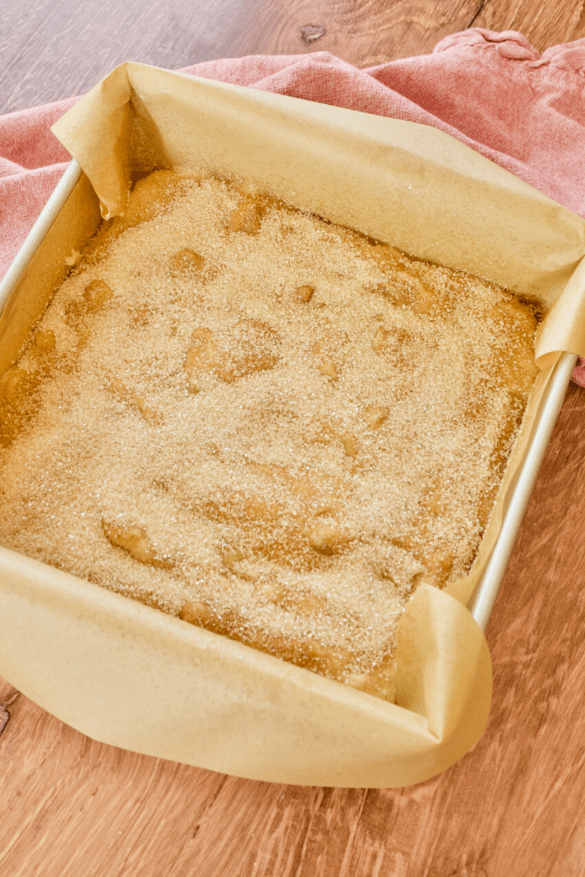 Cinnamon sugar mixture on rhubarb cake.