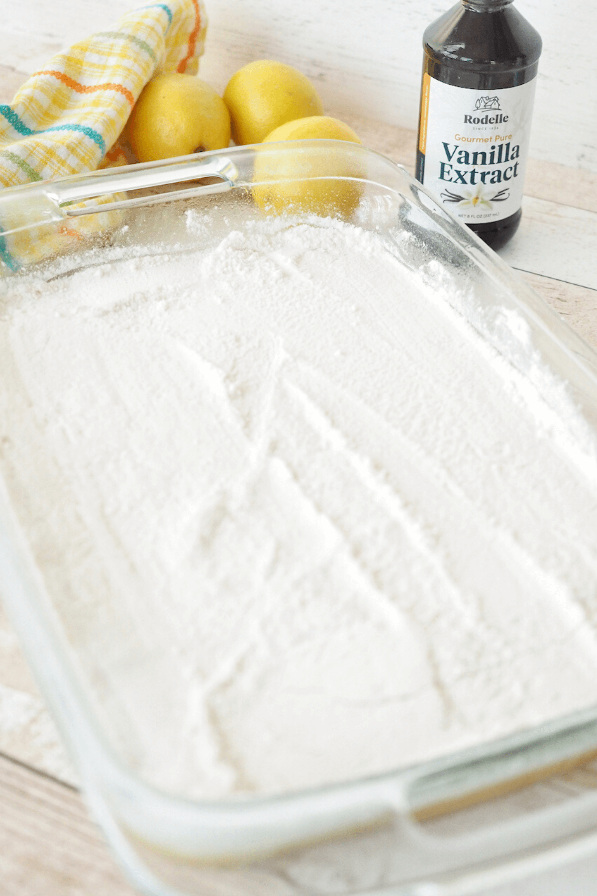 Evenly spread the cake mix over the top of the cream cheese layer. 