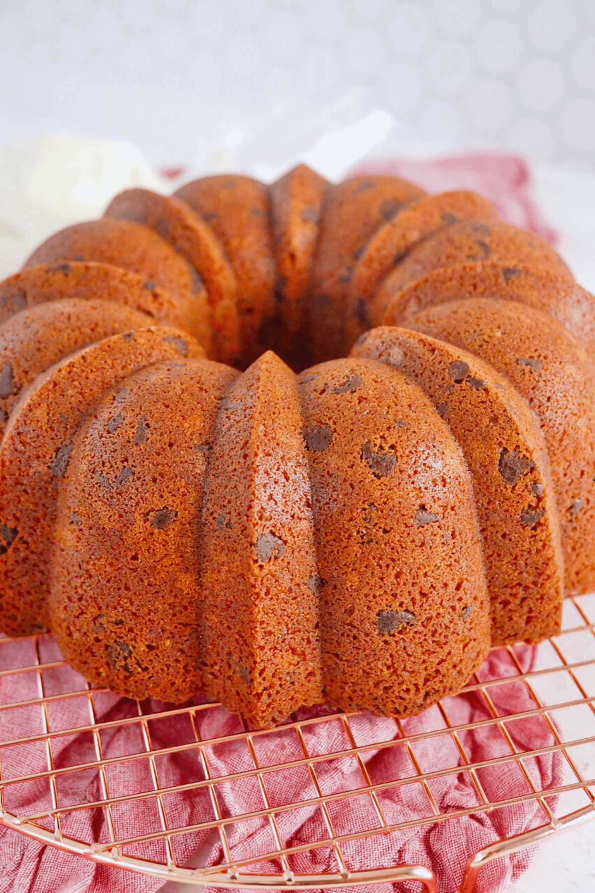 Cooled Red Velvet Bundt Cake on cooling rack. 