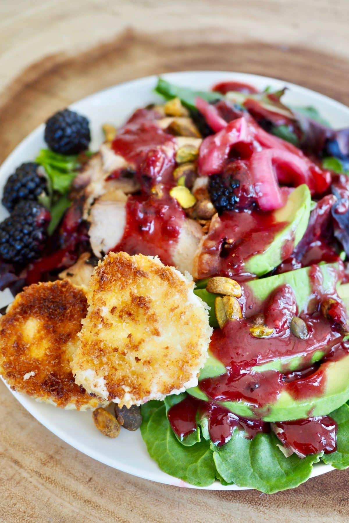 Blackberry chicken salad with pickled red onions. 