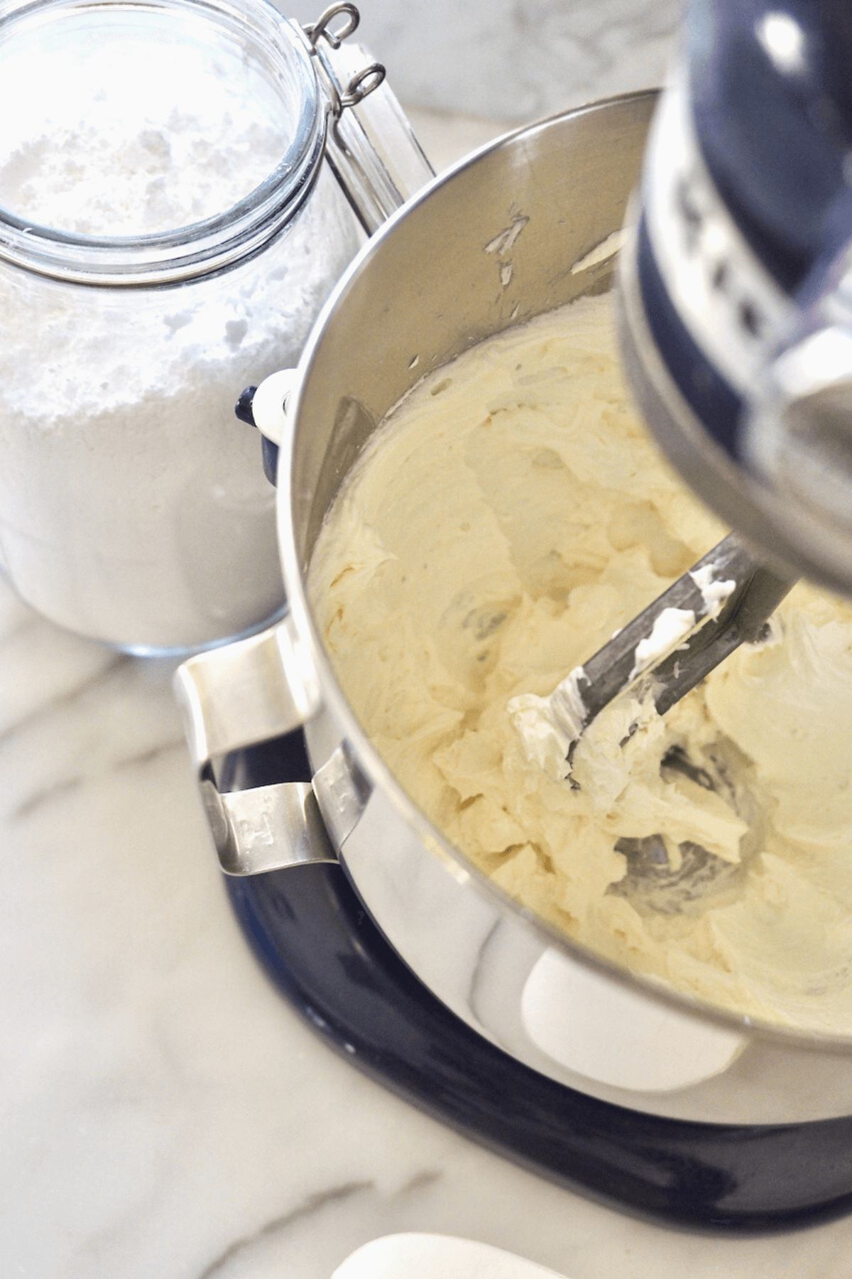 Creaming butter and cream cheese mixture for Bailey's frosting. 