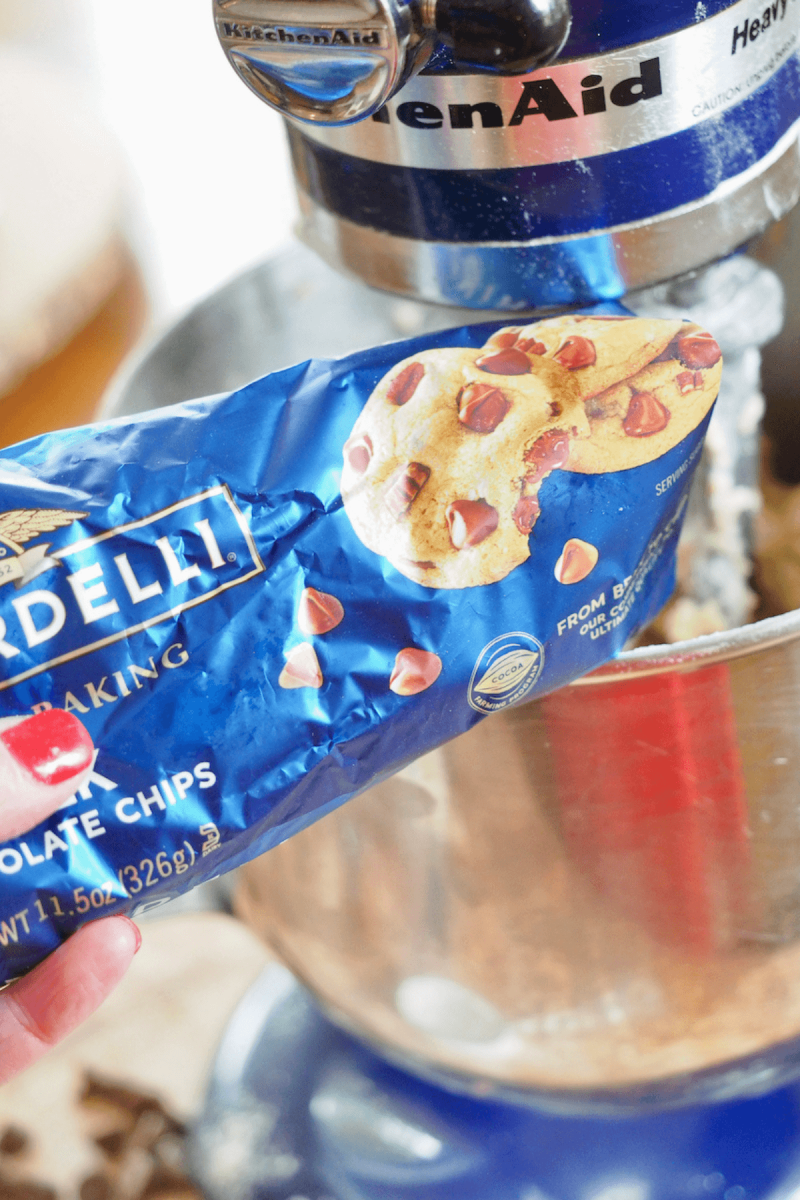 Adding milk chocolate chips to batter.