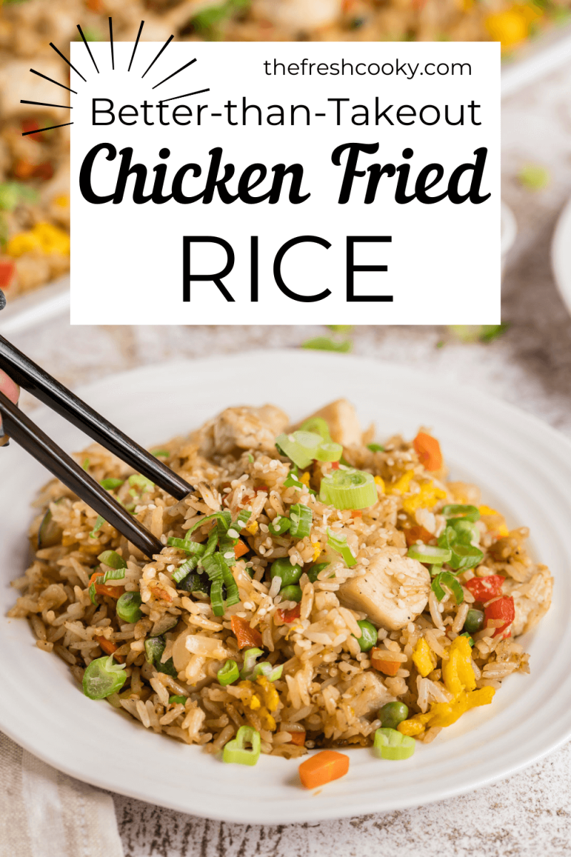 Pin for easy better-than-take-out chicken fried rice with plate of fried rice and hand using chopsticks.