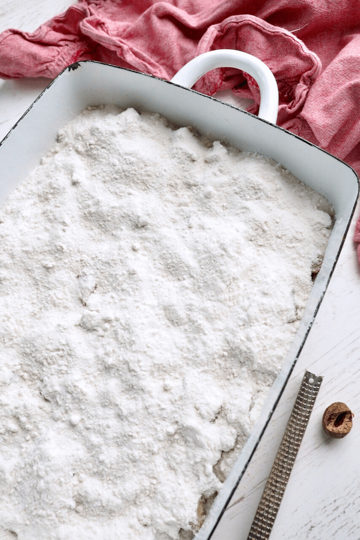 Cake mix poured over top of rhubarb cake. 