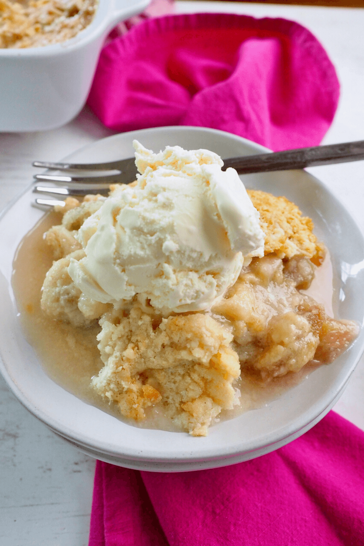 Second attempt rhubarb dump cake, super juicy and delicious, but not quite what I wanted. Slice on a plate ala mode with vanilla ice cream.