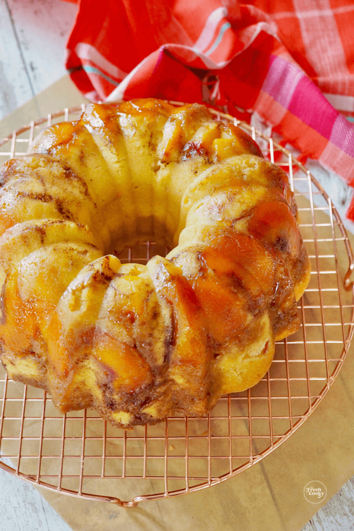 Inverted pound cake on cooling rack. 