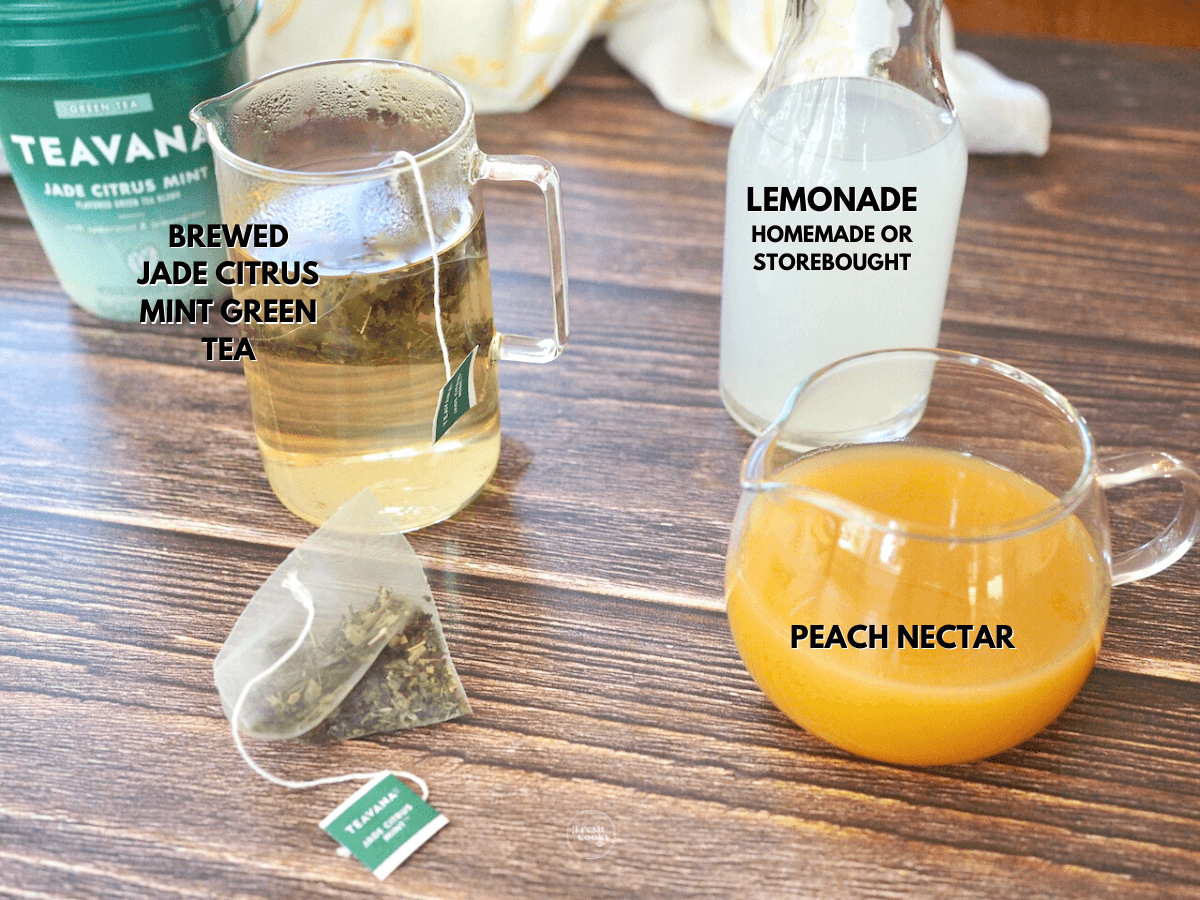 Labeled ingredients for iced peach green tea; L-R Teavana Jade Citrus Mint tea, lemonade, peach nectar.