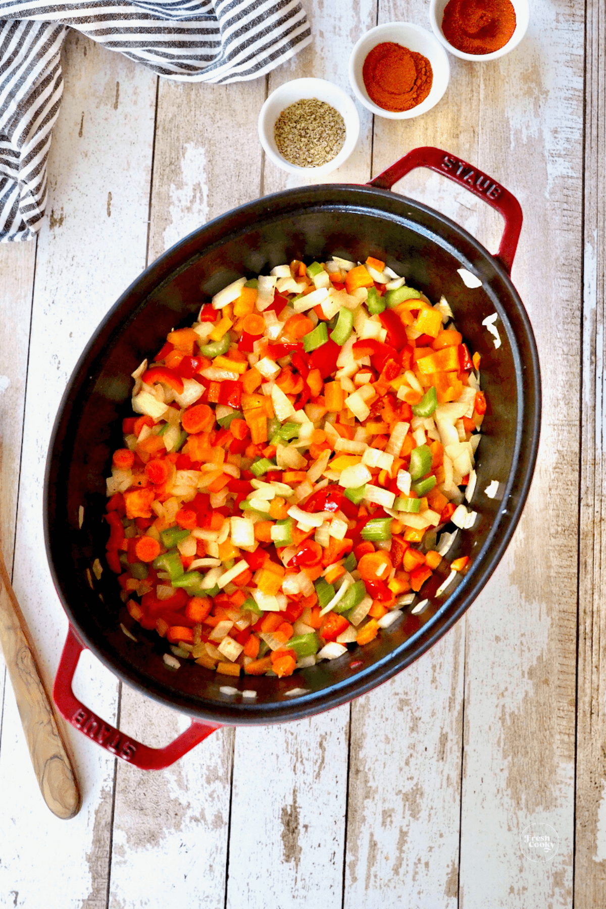 Veggies sauting in dutch oven. 