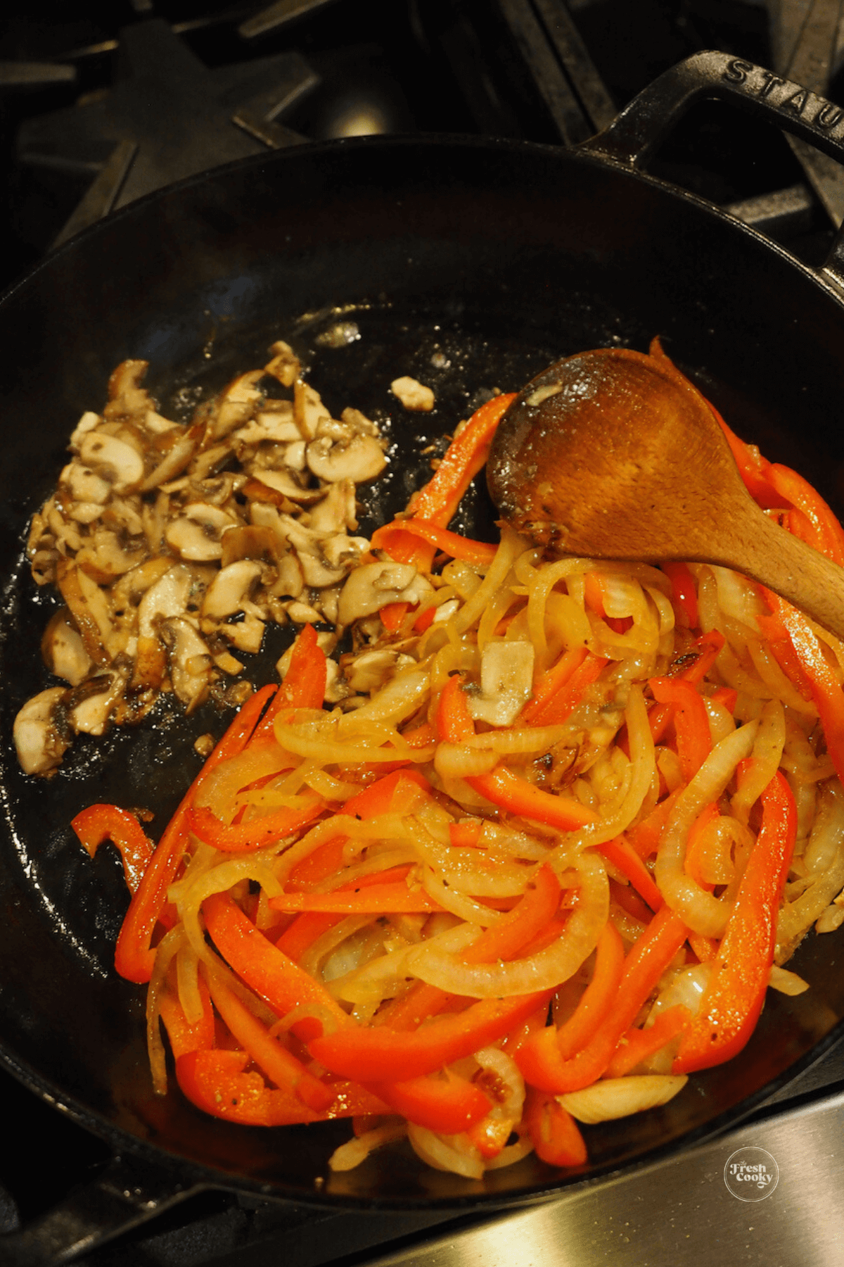 Saute mushrooms in same skillet with peppers and onions.