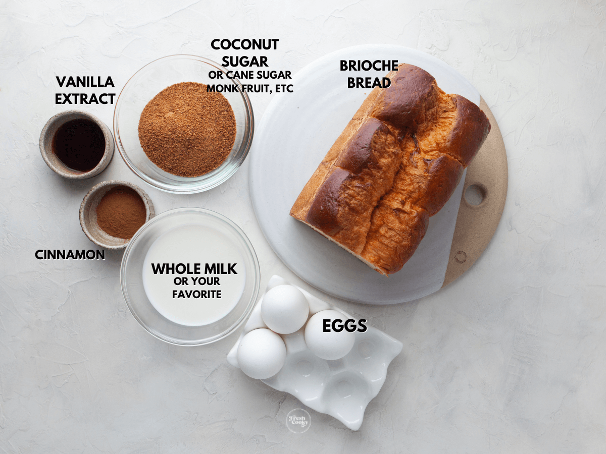 French Toast Sticks labeled ingredients L-R Vanilla, coconut sugar or cane sugar, brioche, eggs, whole milk and cinnamon.