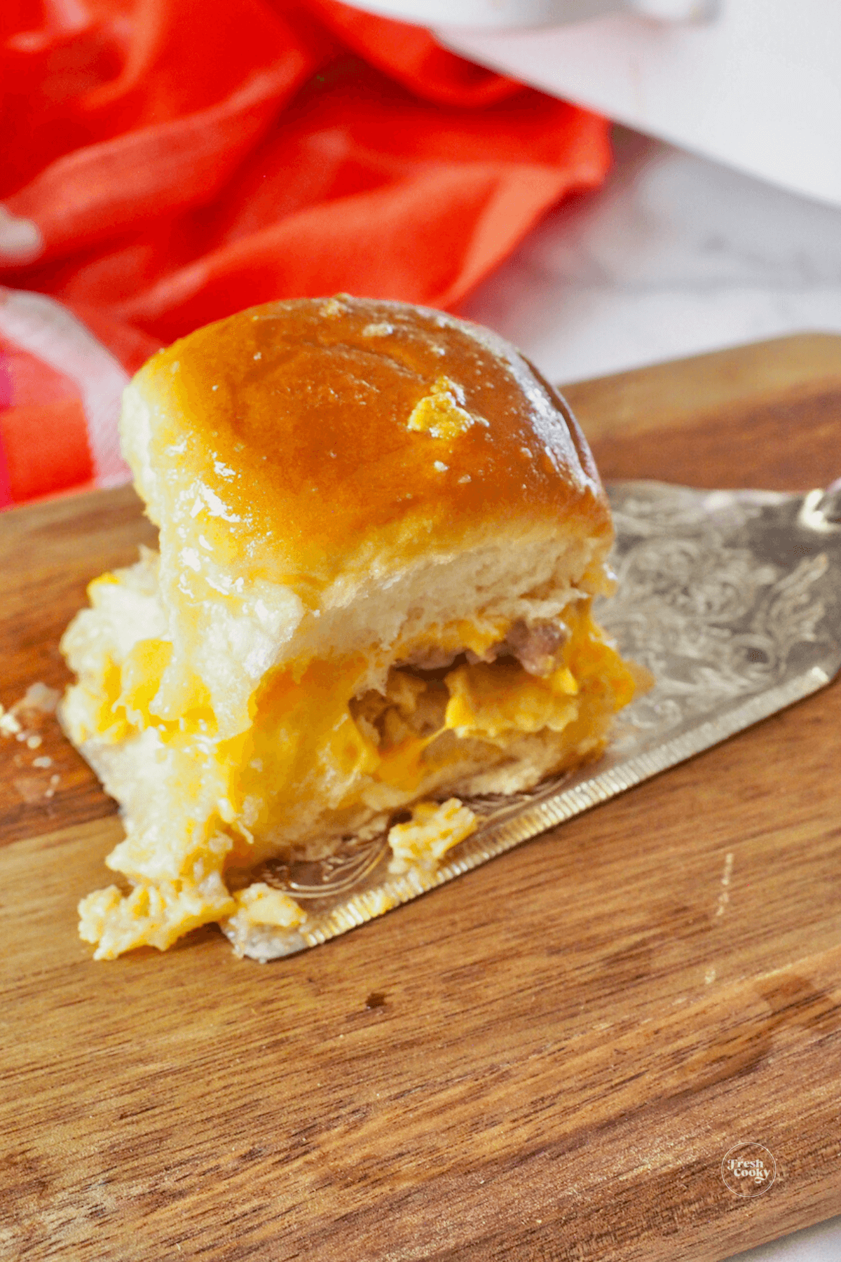 Breakfast slider on a serving spatula.