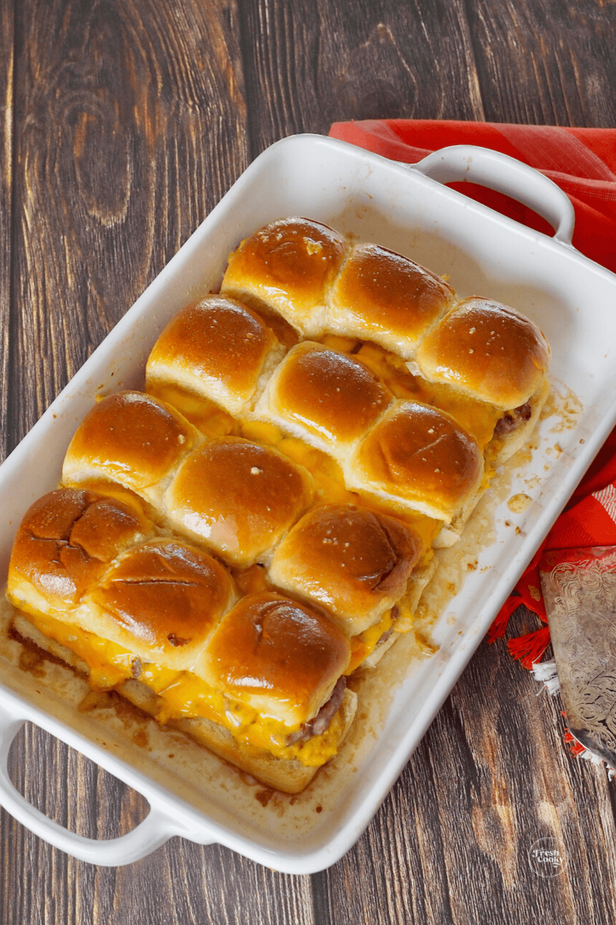 Breakfast egg sliders in casserole dish.