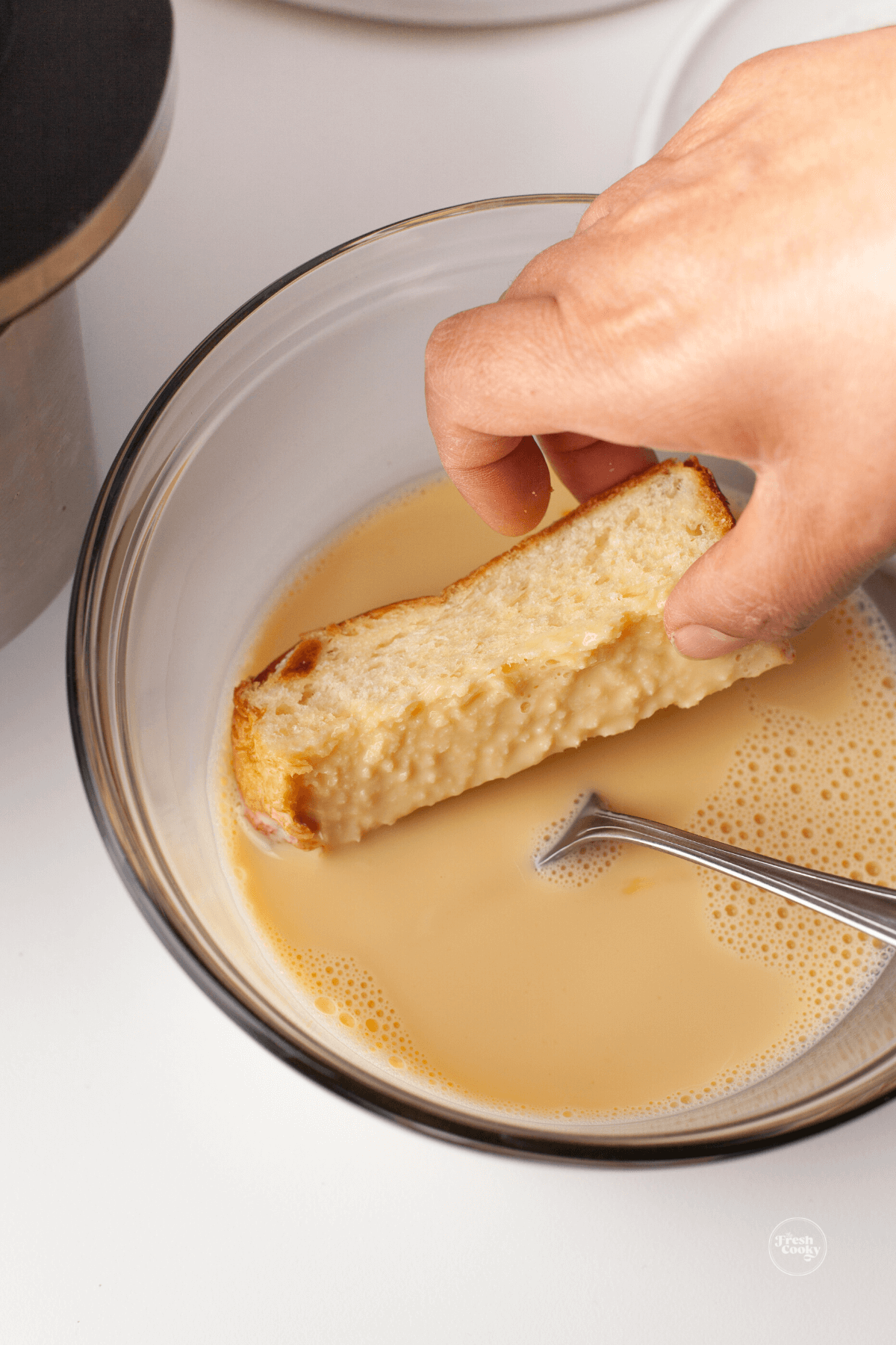 Coat all sides in egg custard with brioche.