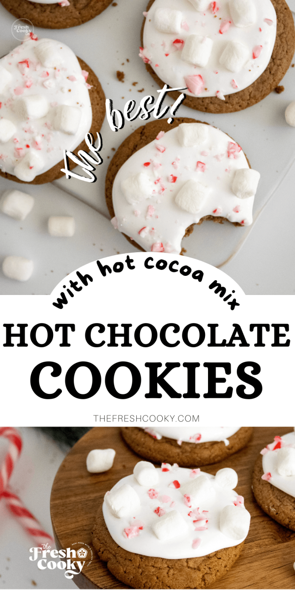 Chewy hot chocolate cookies on tray frosted with marshmallow creme and candy canes and mini marshmallows, to pin.