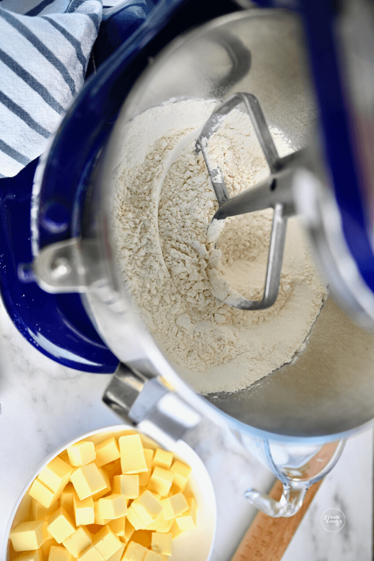 Combine dry ingredients in stand mixer for pie dough.
