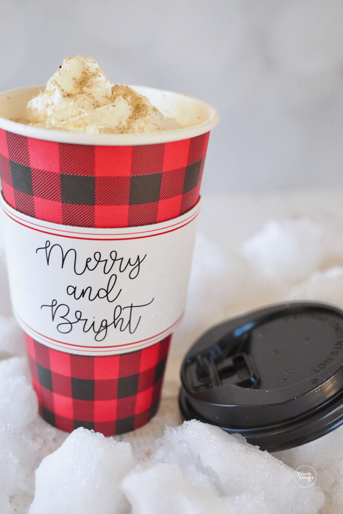 Christmas eggnog latte in cute to-go cup.