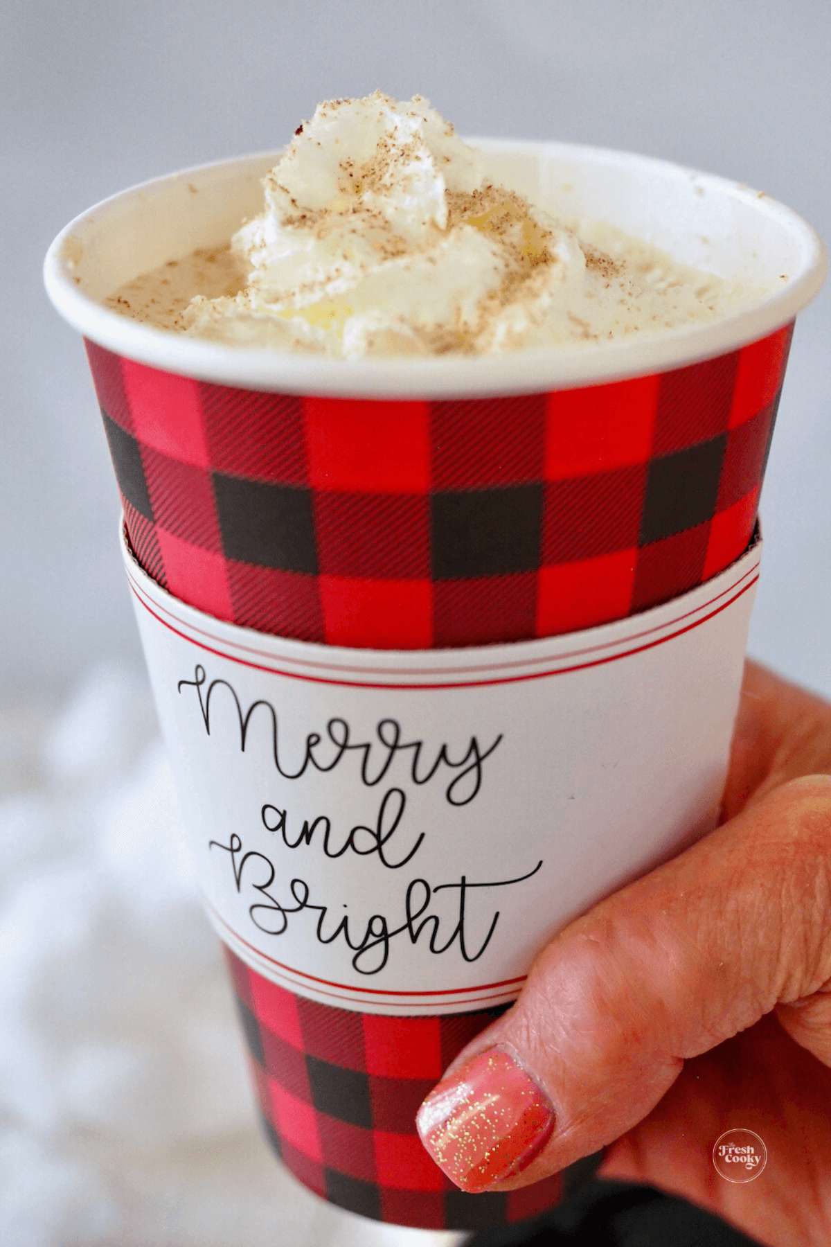 Christmas Eggnog latte in Christmas to-go cup. 