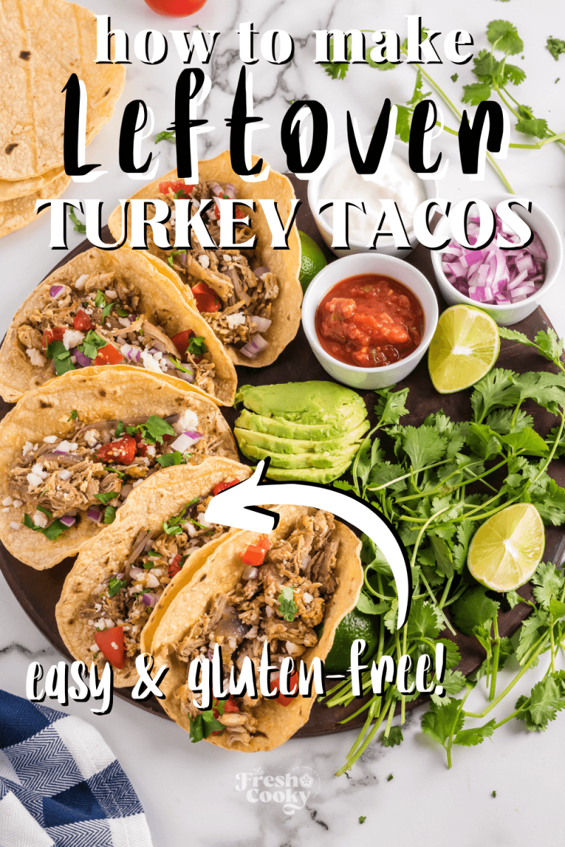 Leftover turkey tacos on a platter with loads of topping options, for pinning.