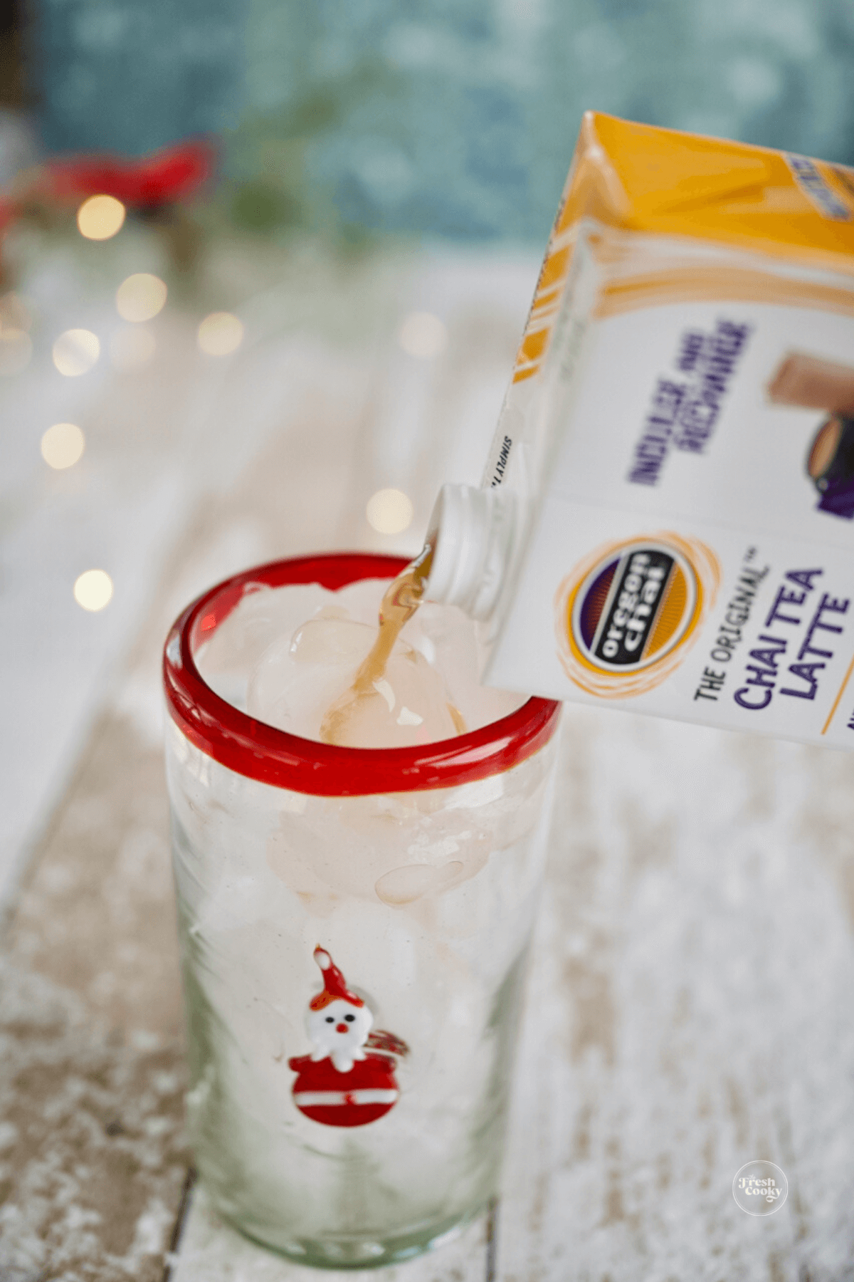Add chai to ice cube filled glass.