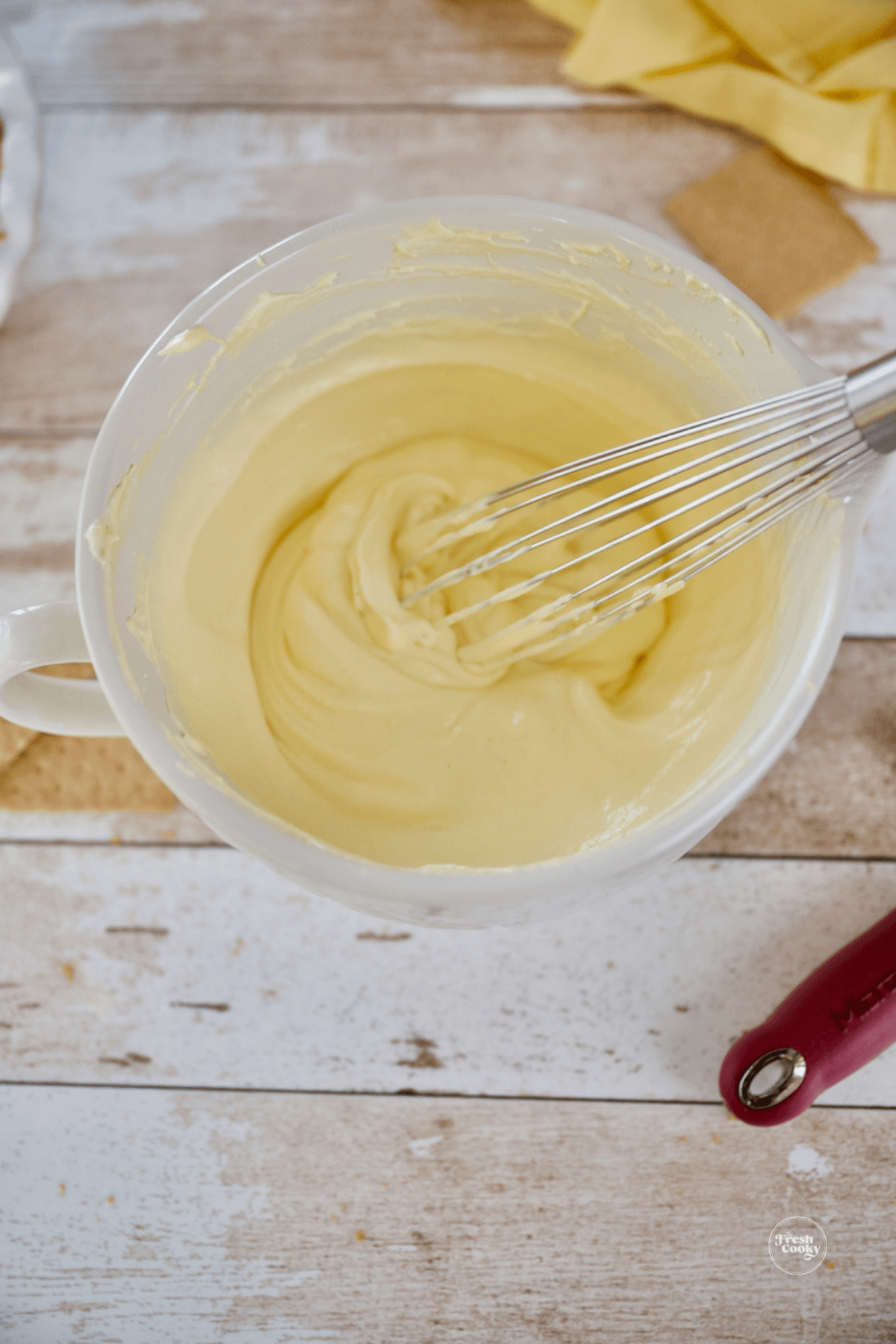 Quickly whisk to completely combine, don't over do it.
