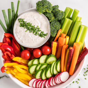 Best veggie dip, surrounded by Crudites for a gorgeous presentation.