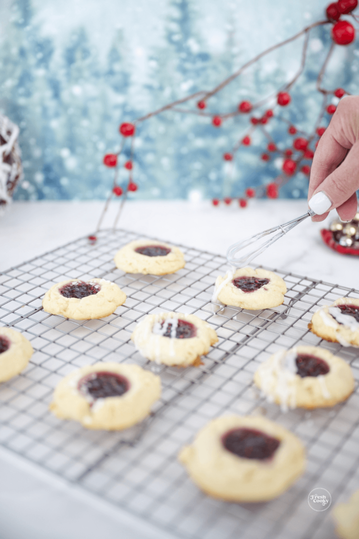 Drizzling on a little powdered sugar glaze onto cookies.