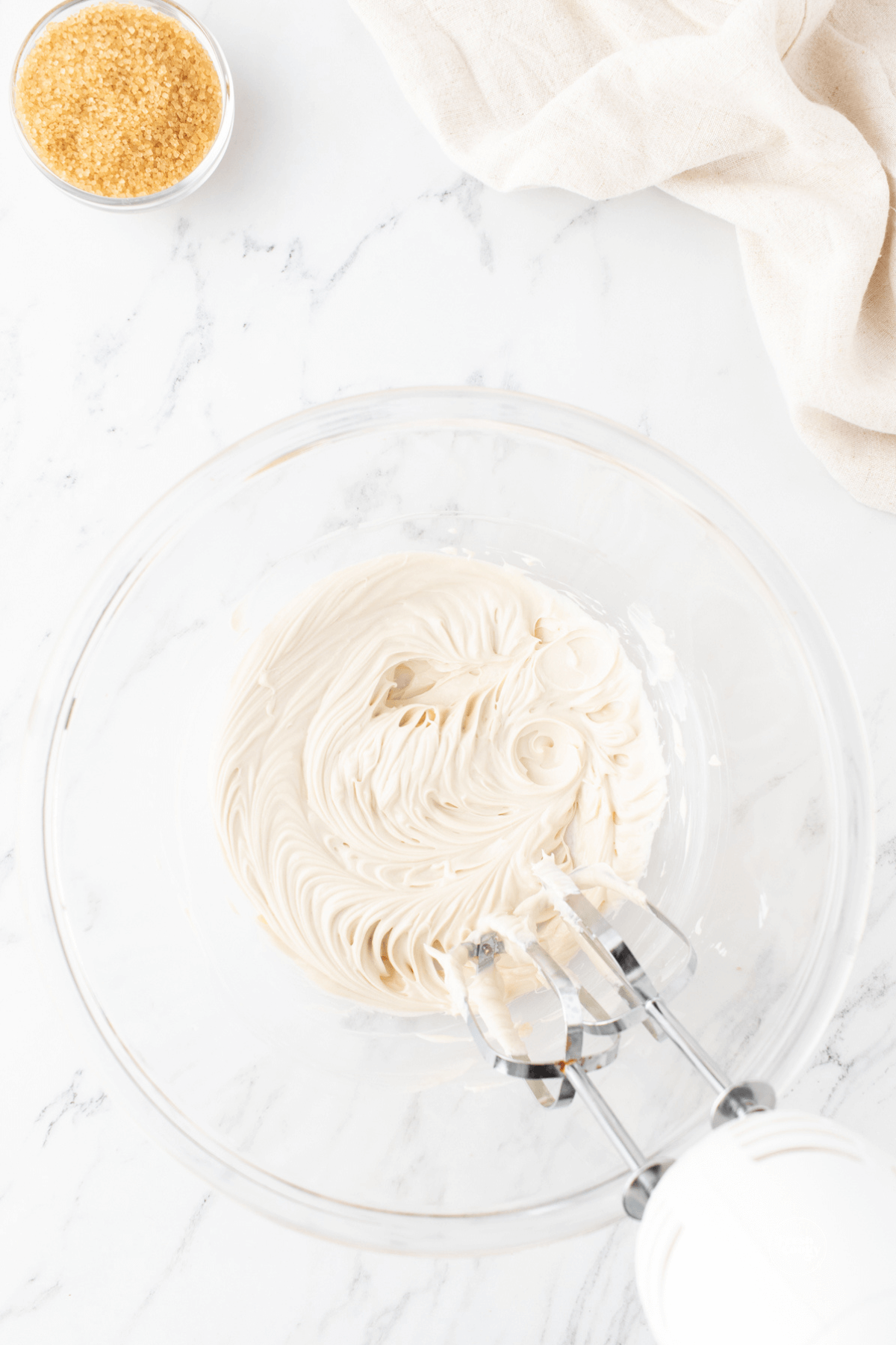 Mixing cream cheese mixture for pastries.
