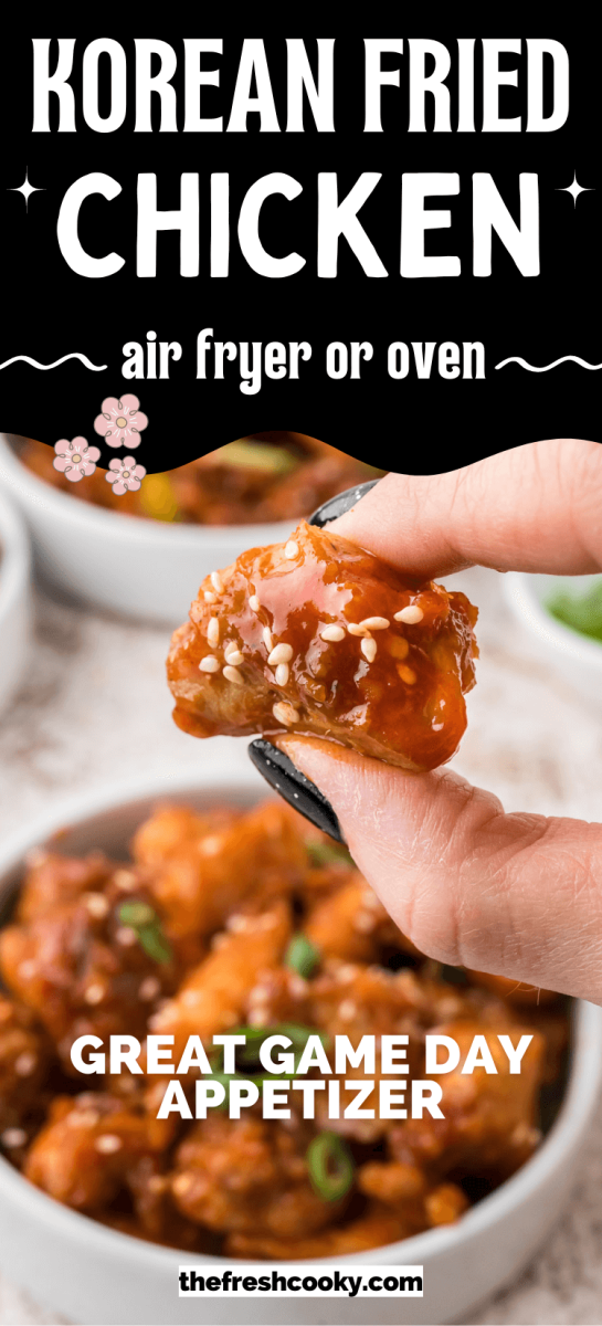 Korean Fried Chicken hand holding piece of sticky sweet-spicy Korean chicken, for pinning.