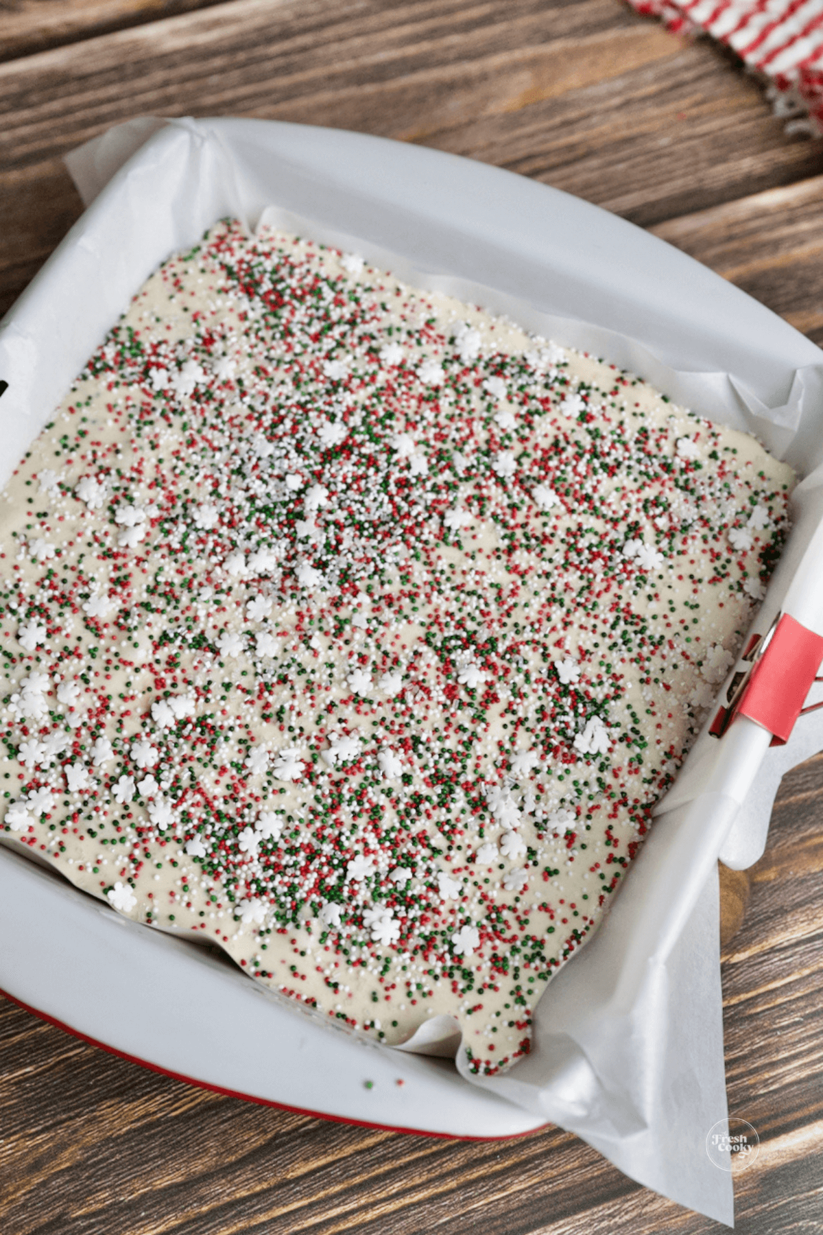 https://www.thefreshcooky.com/wp-content/uploads/2023/01/Christmas-Sugar-Cookie-Fudge-in-pan.png