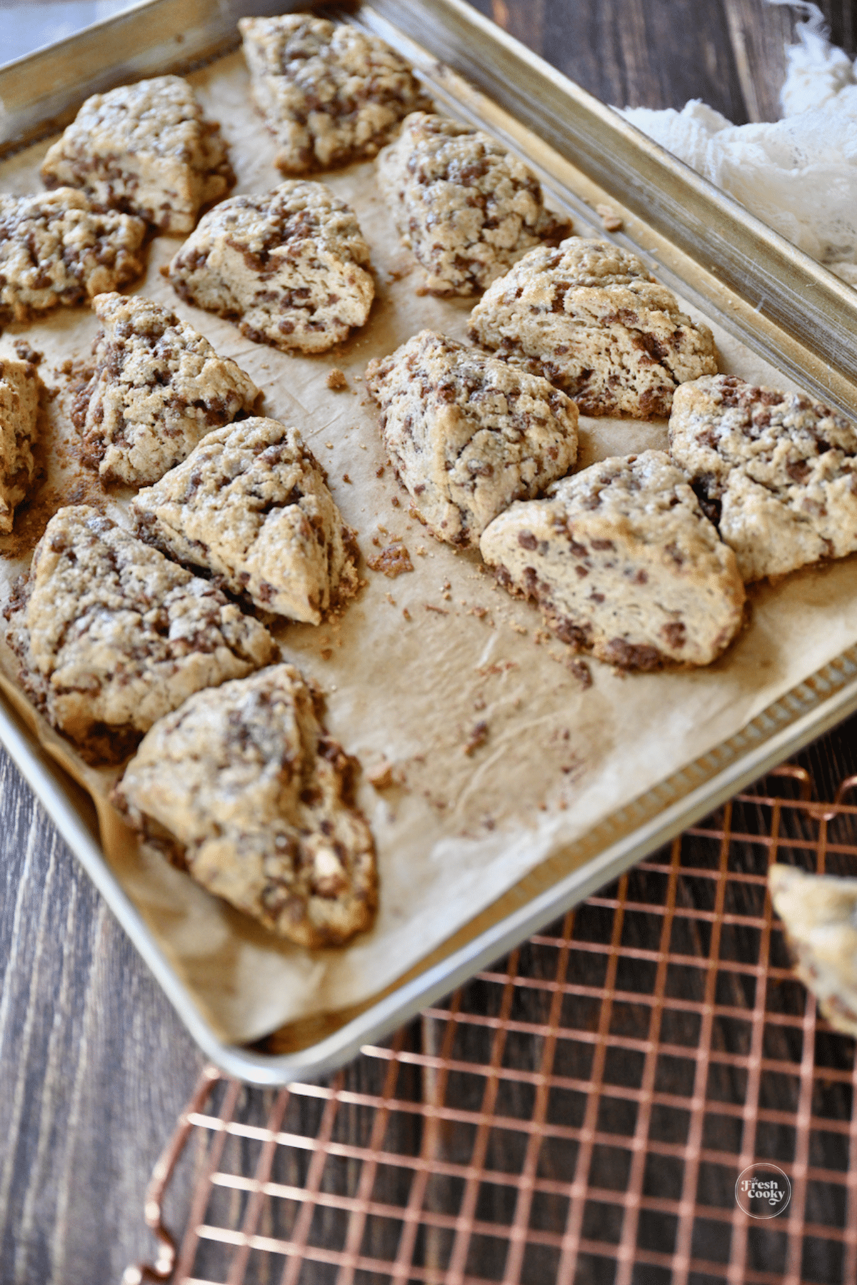 Baked scones on baking sheet. 