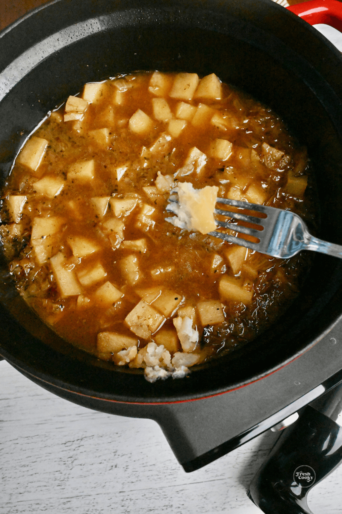 Soft potatoes after slow cooking.