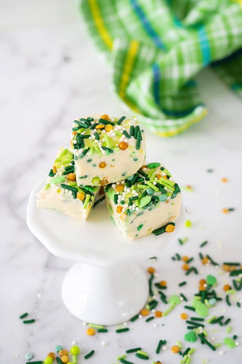 Gold and green sprinkles on sugar cookie fudge for St. Patrick's day. 