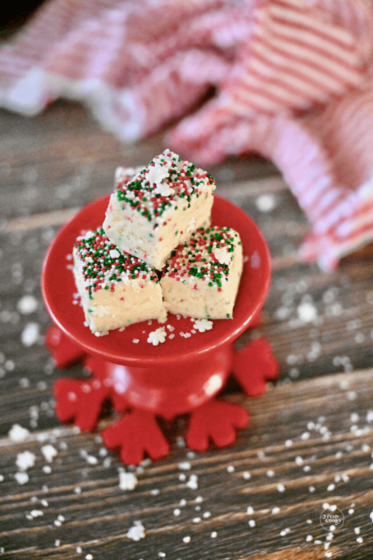 Sugar Cookie Fudge for Christmas on mini pedestal.