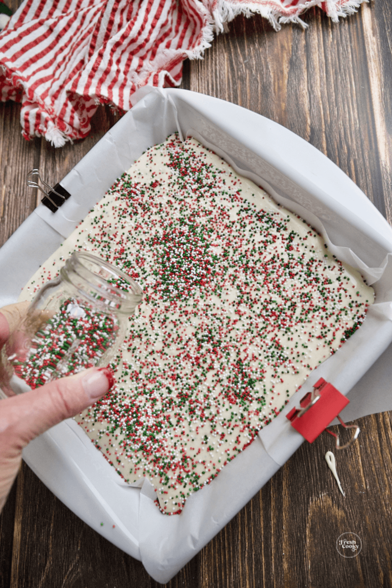 If desired, add extra sprinkles to top of fudge.