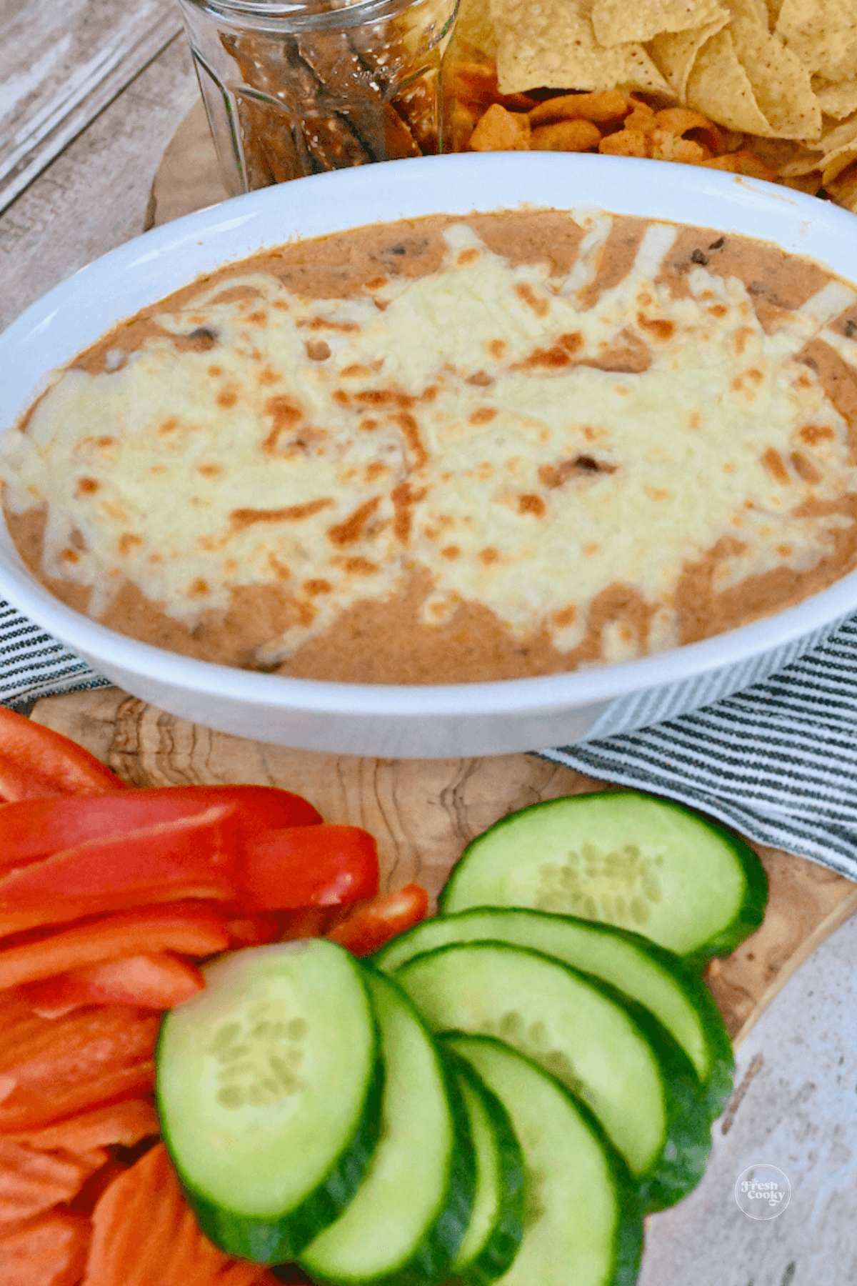 Easy 3 ingredient chili cheese dip with veggies for a low carb appetizer.