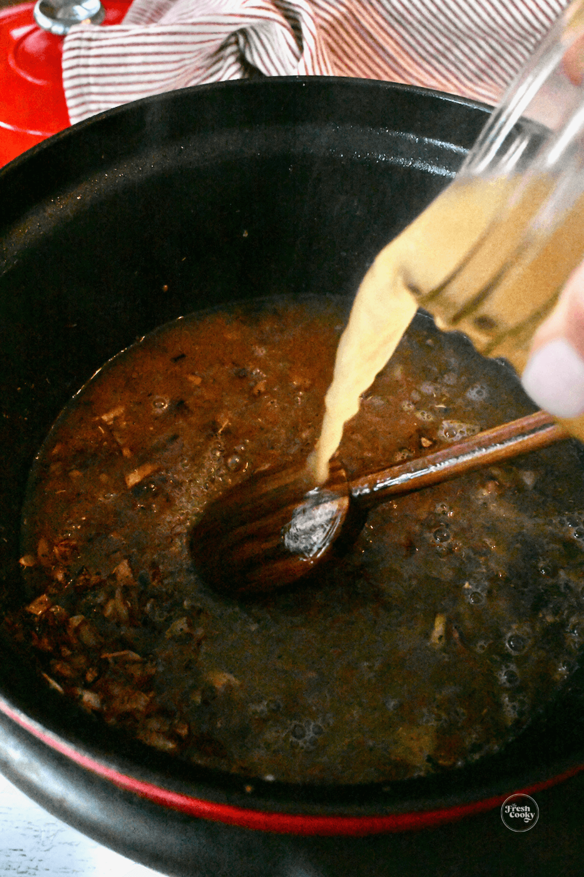 Deglaze pan with chicken stock.