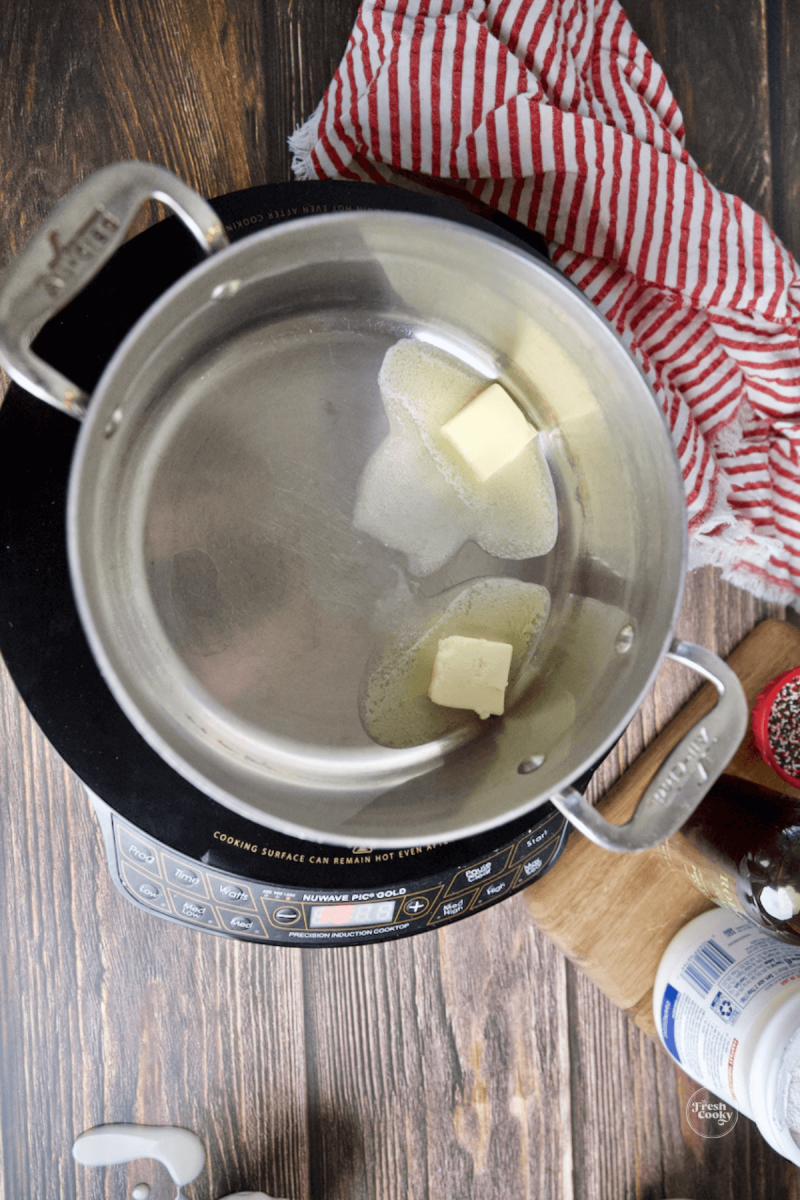 Melting butter in saucepan. 