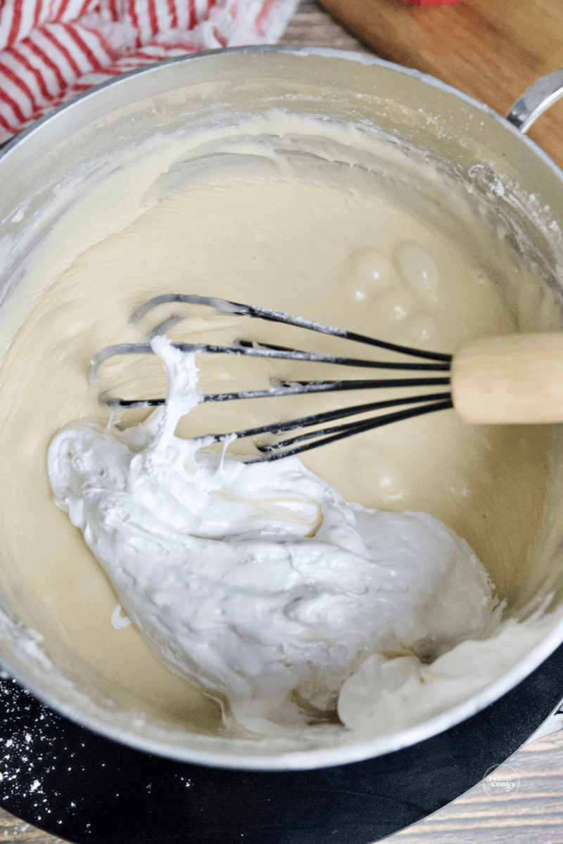 Whisk in marshmallow creme to fudge mixture. 