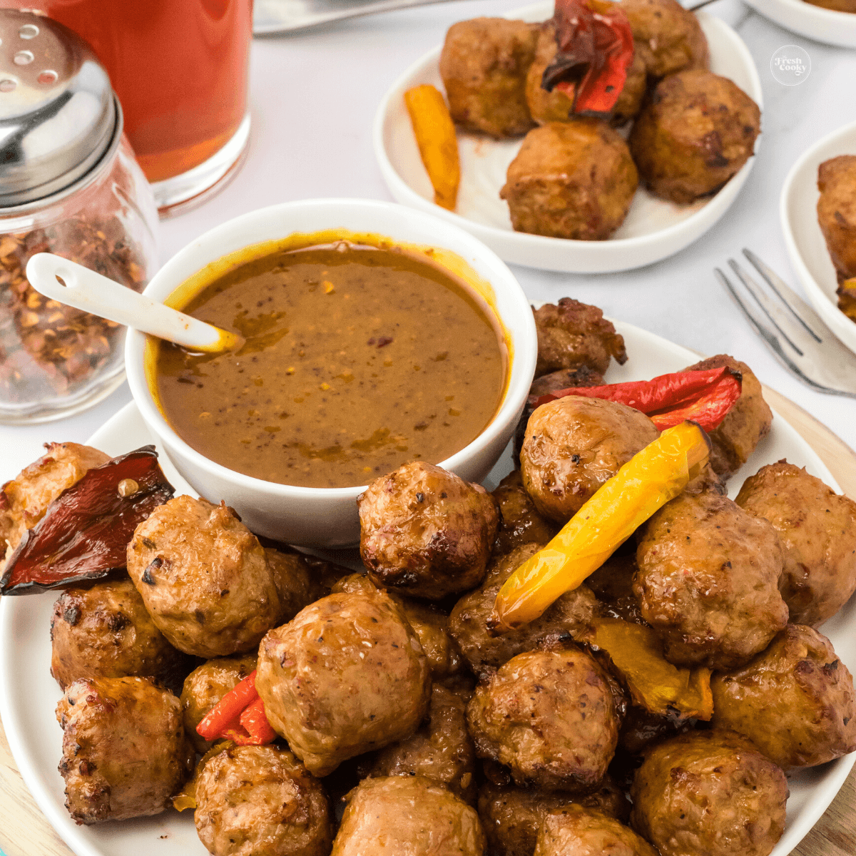 Air fryer sausage and peppers with spicy mustard sauce; sausage bites.