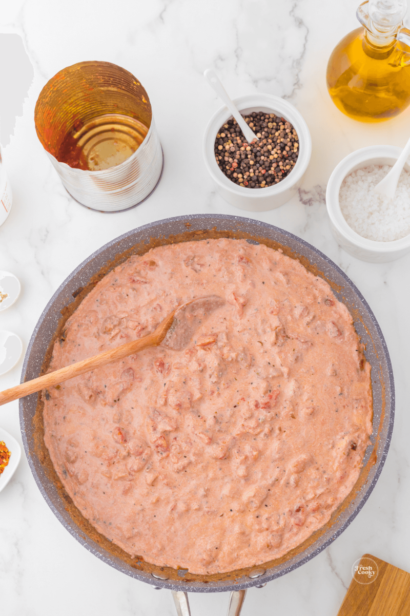 Stir cream and cheese into the pasta sauce.