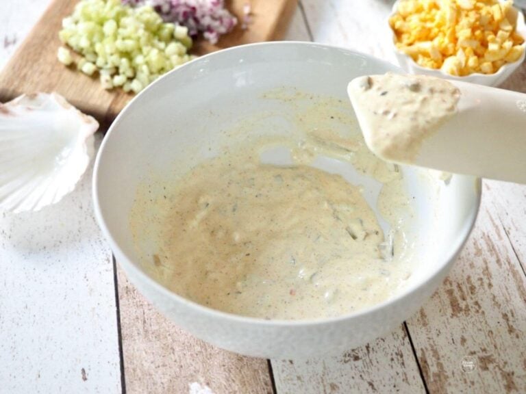 Tuna salad dressing in bowl.