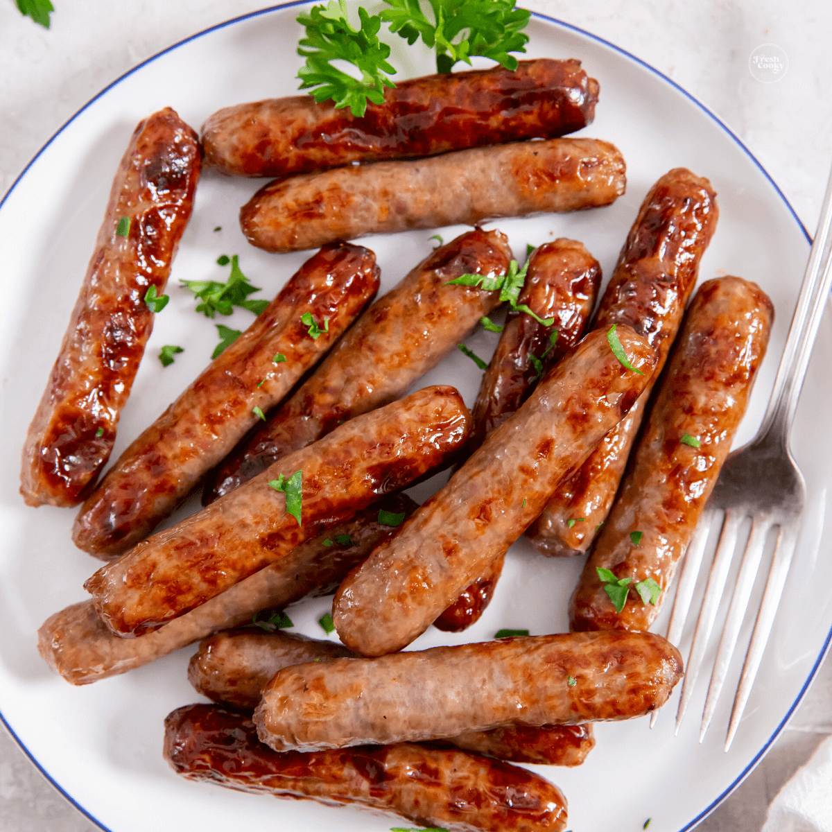 Easy Air Fryer sausage links on plate.