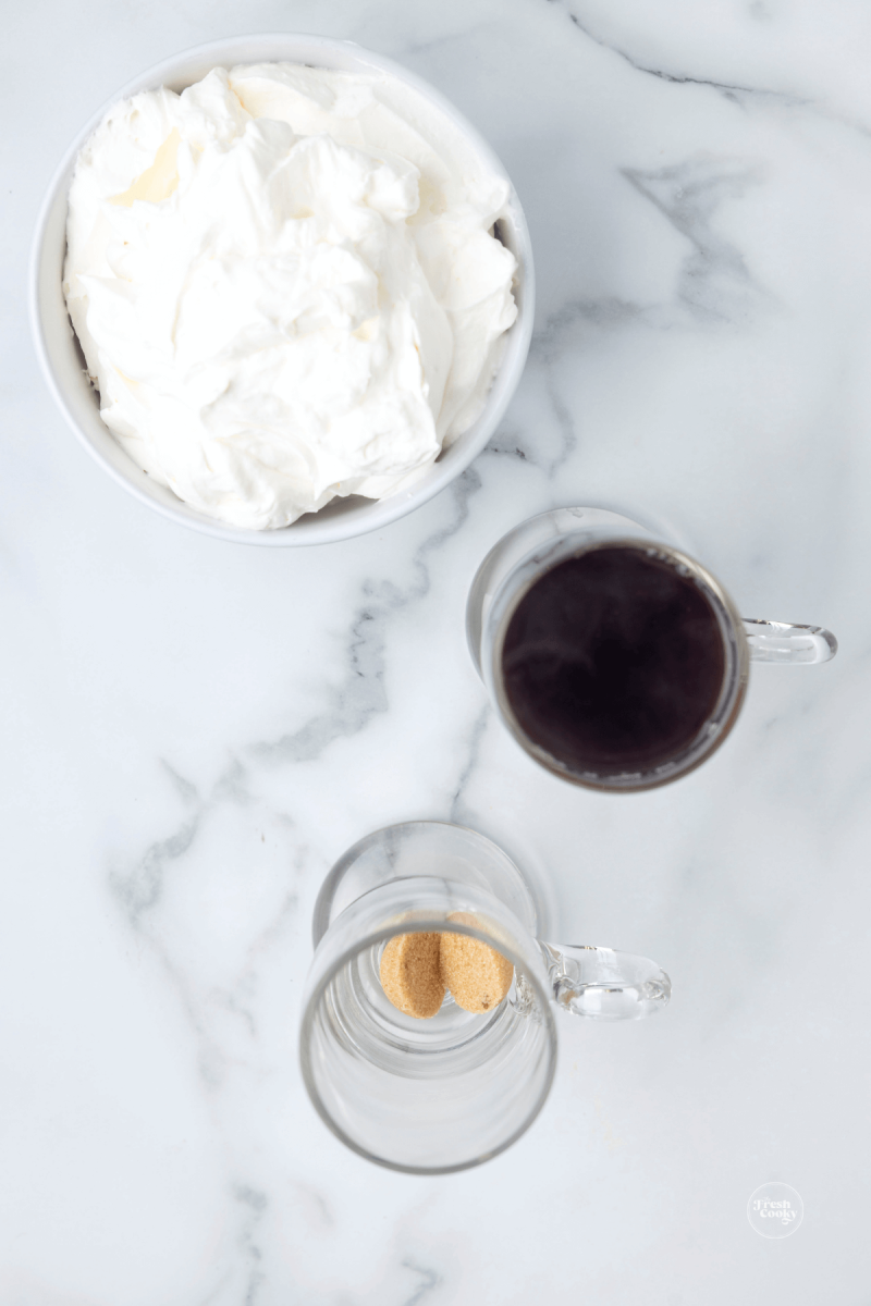 Add brown sugar to bottom of glass mug for Irish coffee.