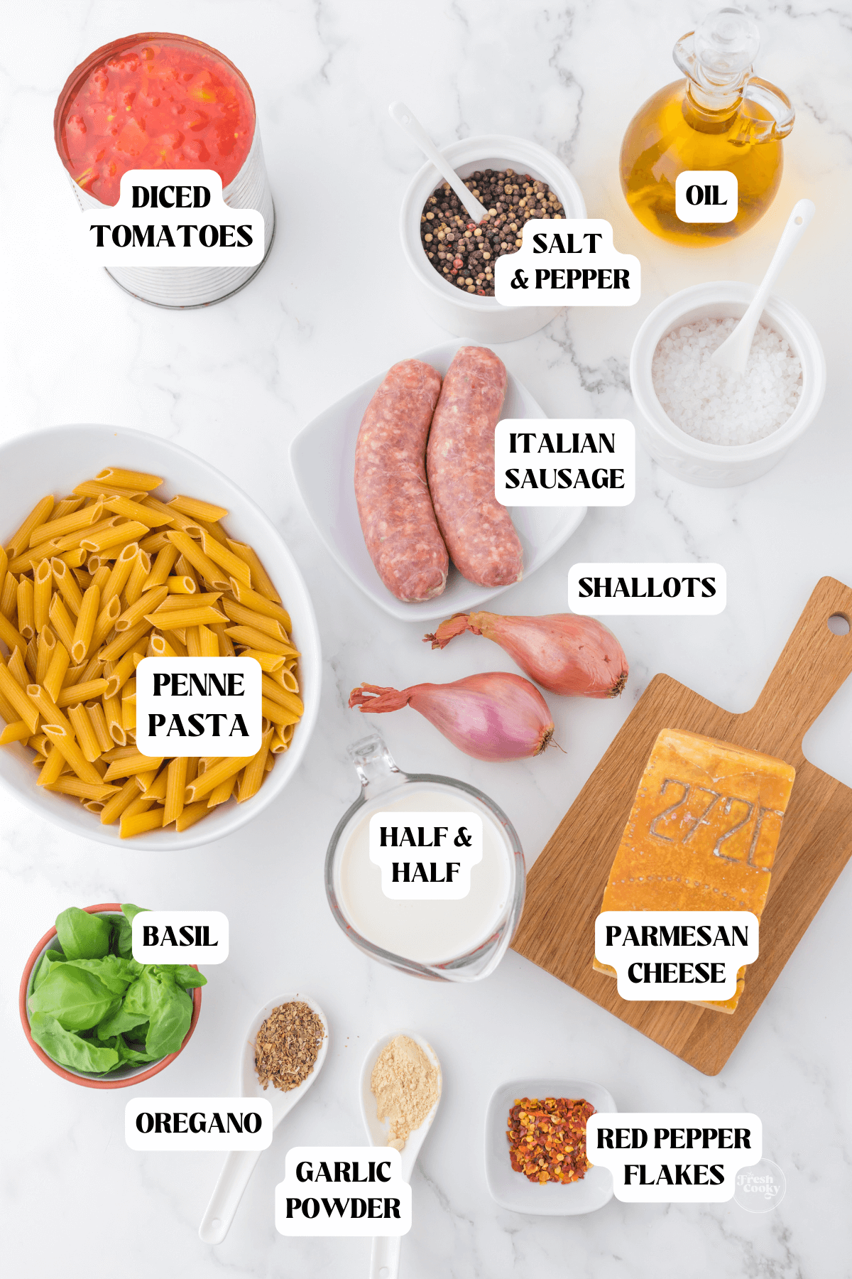 Labeled ingredients for one pot sausage pasta.