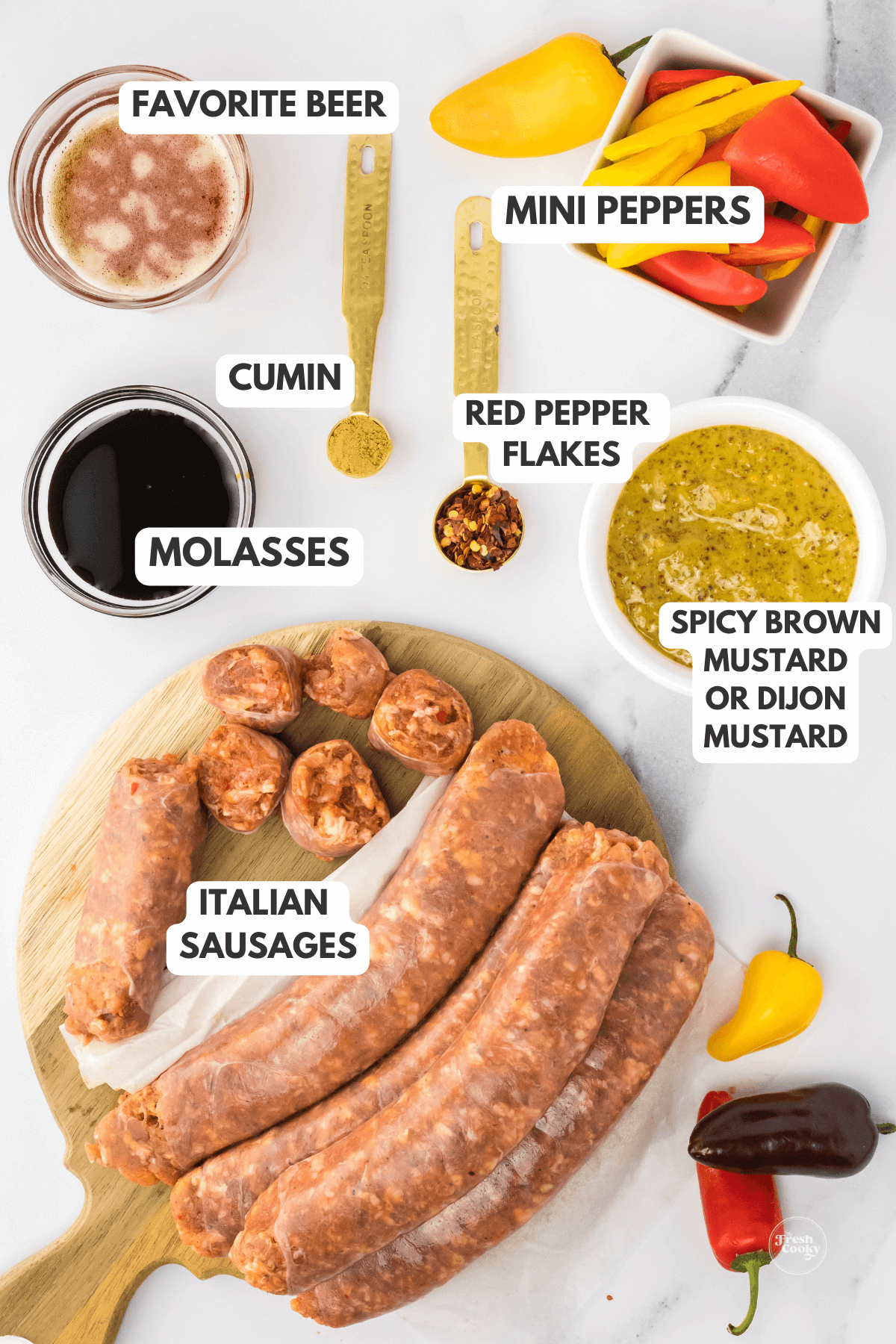 Labeled ingredients for air fryer sausage and peppers with spicy mustard sauce.