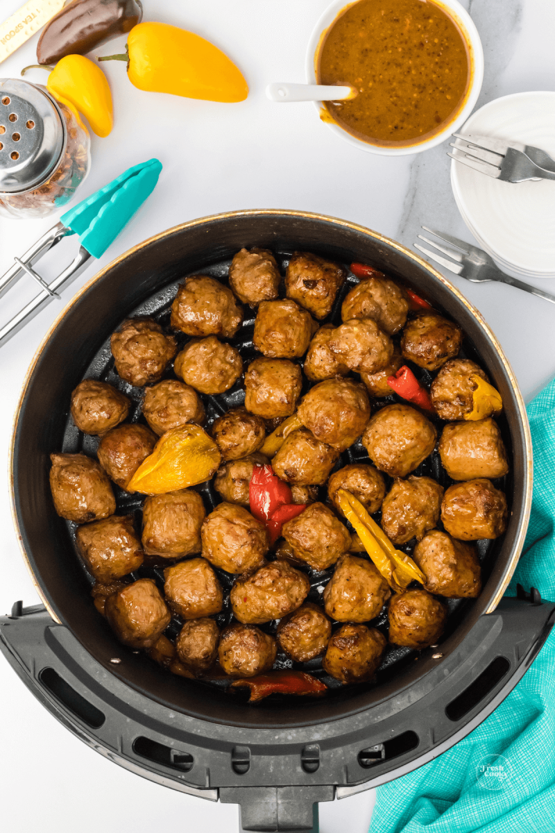 Cooked Italian sausage and peppers in air fryer. 