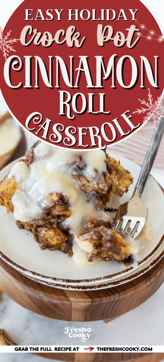 Serving of gooey cinnamon roll casserole topped with drizzle of cream cheese icing, to pin.
