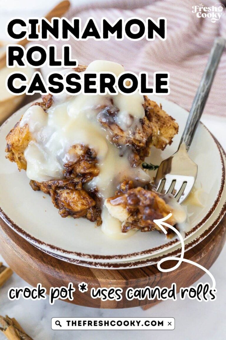 Serving of cinnamon roll casserole drizzled with frosting, to pin.