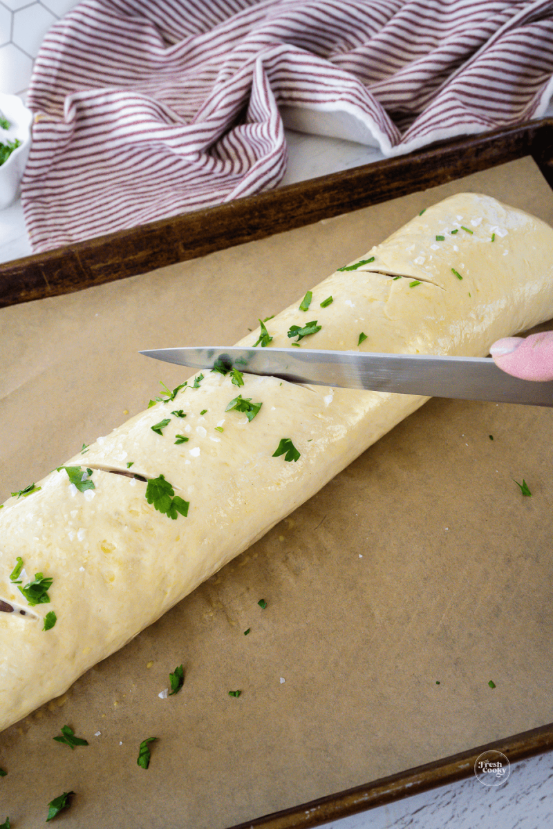 Slice a few slits on top to allow steam to escape avoiding a soggy stromboli.